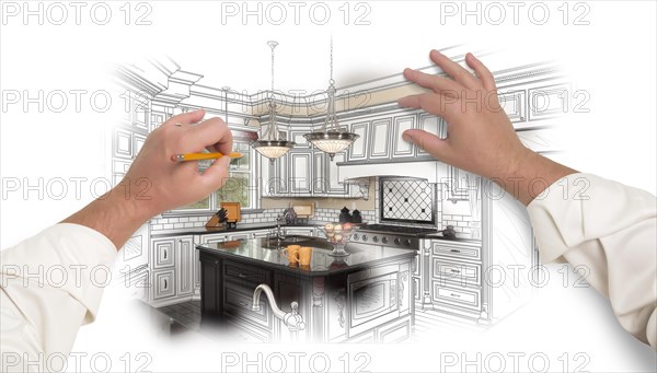 Male hands sketching with pencil A custom kitchen with photo showing through