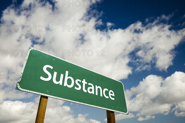 Substance road sign with dramatic clouds and sky