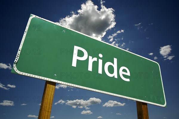 Pride road sign with dramatic clouds and sky