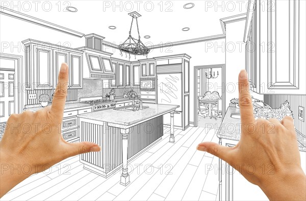Female hands framing custom kitchen design drawing
