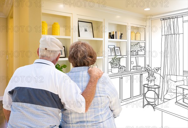 Senior couple facing custom built-in shelves and cabinets design drawing gradating to finished photo
