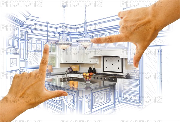 Female hands framing custom kitchen design drawing and photo combination