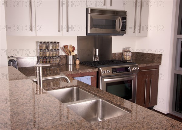 Modern kitchen with brushed aluminum appliances