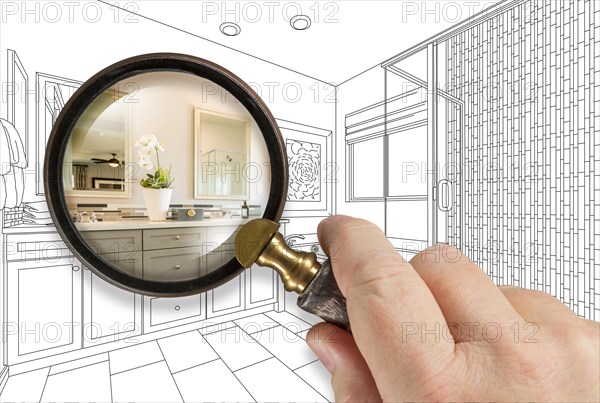 Hand holding magnifying glass revealing custom bathroom design drawing and photo combination