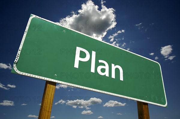 Plan road sign with dramatic clouds and sky