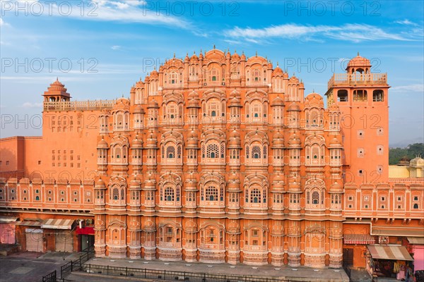 Famous landmak pink Hawa Mahal Palace of winds in the morning Mughal art cultural heritage famous tourist attraction. Jaipur