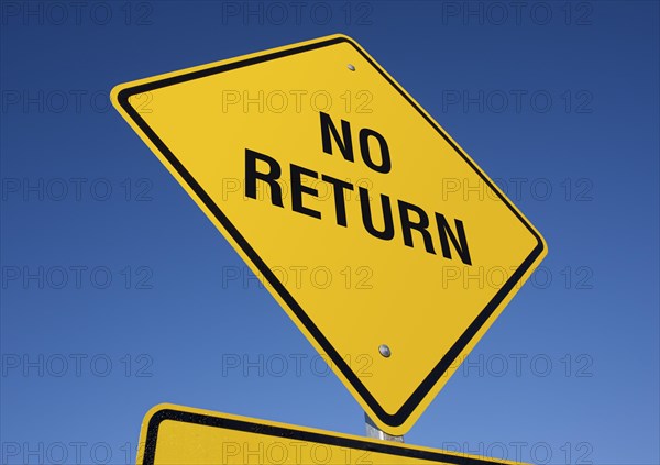 No return yellow road sign against a deep blue sky with clipping path