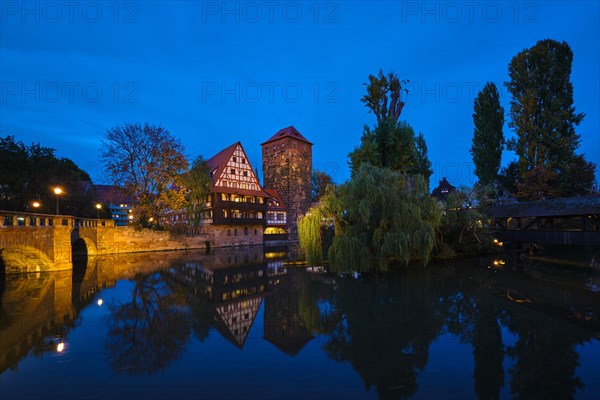 Nuremberg city houses on riverside of Pegnitz river from Maxbrucke