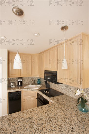 Modern kitchen interior with marble countertop