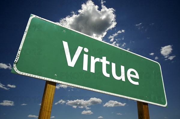 Virtue road sign with dramatic clouds and sky