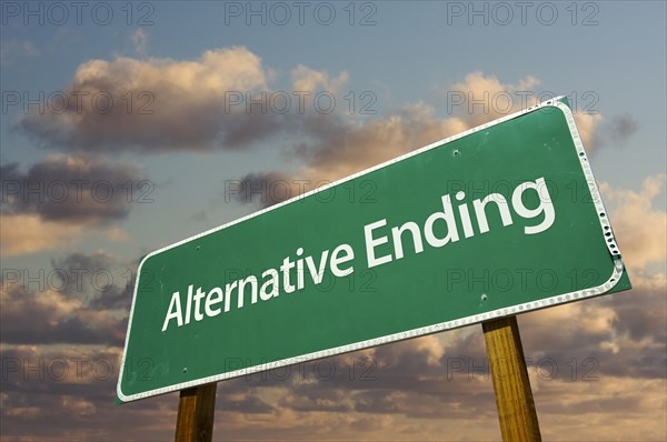 Alternative ending green road sign with dramatic clouds and sky