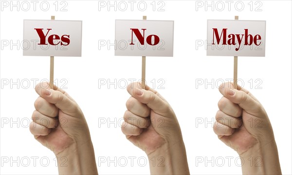 Three signs in male fists saying yes