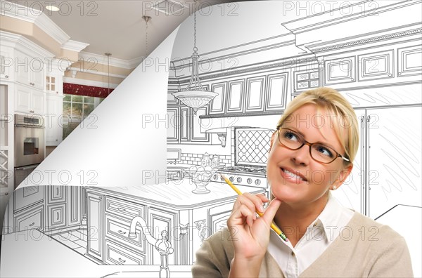 Woman facing kitchen drawing page corner flipping with photo behind