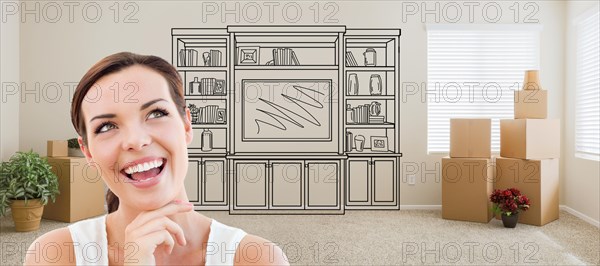 Woman inside room with moving boxes glancing toward entertainment unit drawing on wall