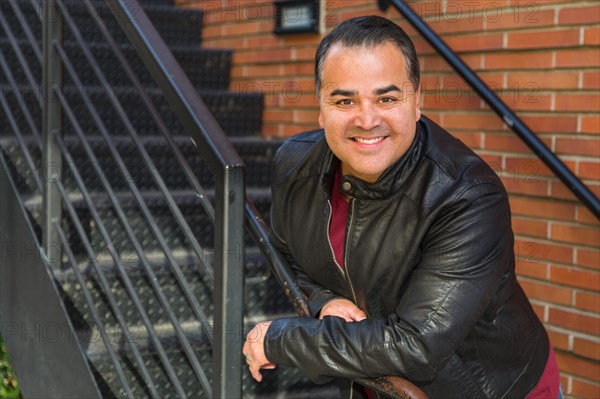 Headshot portrait of handsom hispanic man