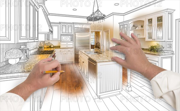 Male hands sketching with pencil A custom kitchen with photo showing through