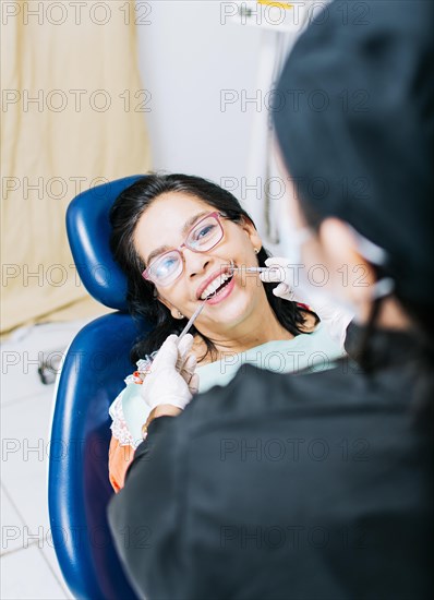 Patient checked by dentist