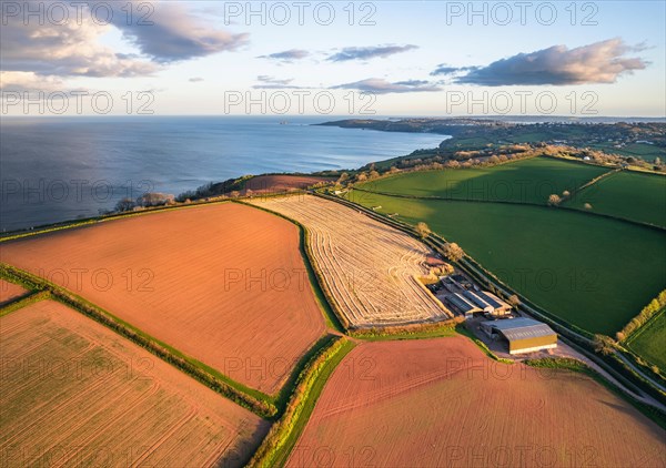 Devon Fields and Farmlands at sunset time from a drone over Labrador Bay
