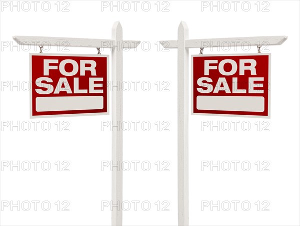 Pair of left and right facing for sale real estate signs with clipping path isolated on white