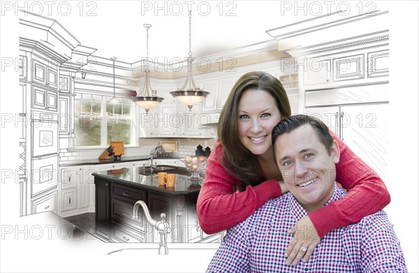 Happy couple with kitchen design drawing and photo behind