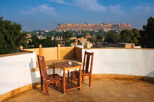 Rooftop Table with chairs with view of tourist landmark of Rajasthan
