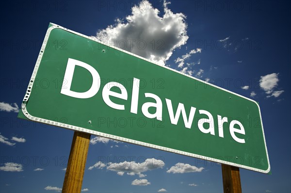 Delaware road sign with dramatic clouds and sky