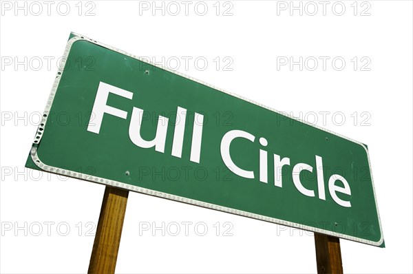 Full circle green road sign isolated on a white background with clipping path