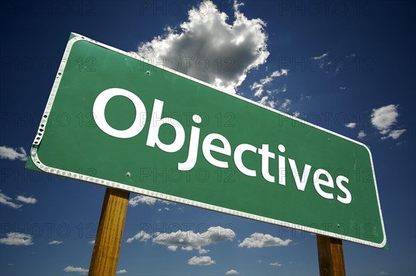 Objectives road sign with dramatic clouds and sky