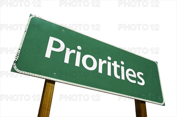 Priorities green road sign isolated on a white background with clipping path