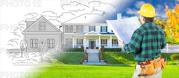 Male contractor with hard hat and tool belt looking at custom house drawing photo combination on white