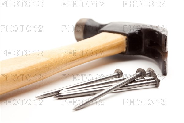 Hammer and nails isolated on a white background