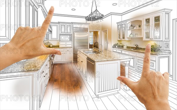 Female hands framing custom kitchen design drawing and photo combination
