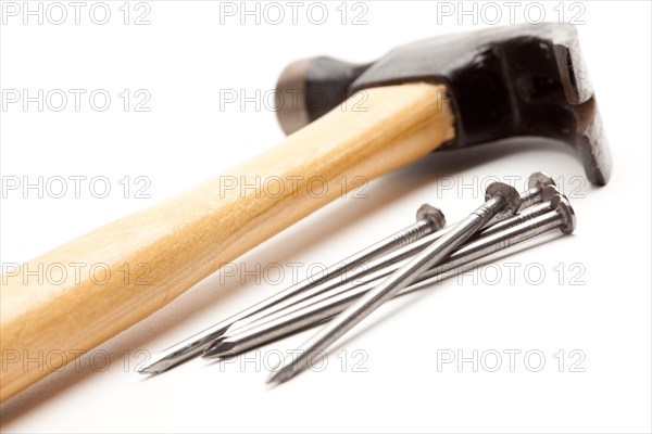 Hammer and nails isolated on a white background