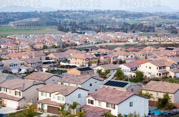 Contemporary neighborhood houses roof tops and horizon view