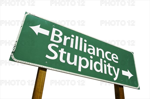 Brilliance and stupidity green road sign isolated on a white background with clipping path