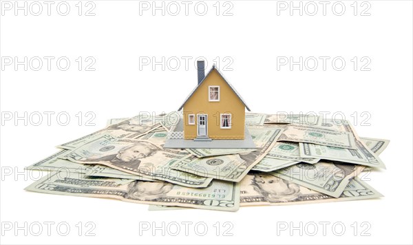 Home and money isolated on a white background