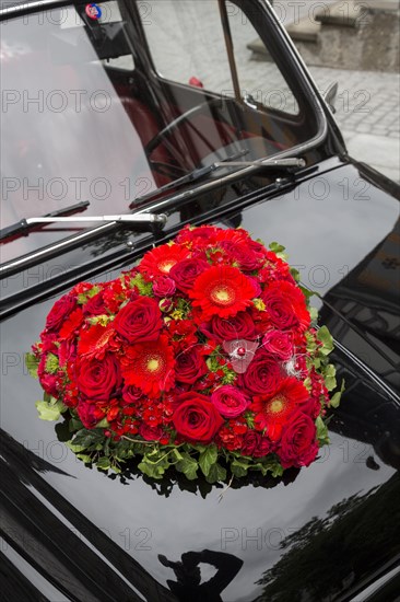 Heart of flowers on car