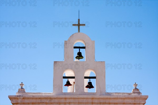 Three church bells adjacent to San Xaviers mission in Tucson