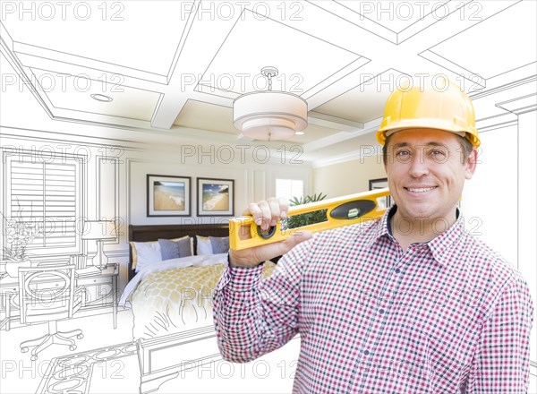 Smiling contractor in hard hat with level over custom bedroom drawing and photo combination