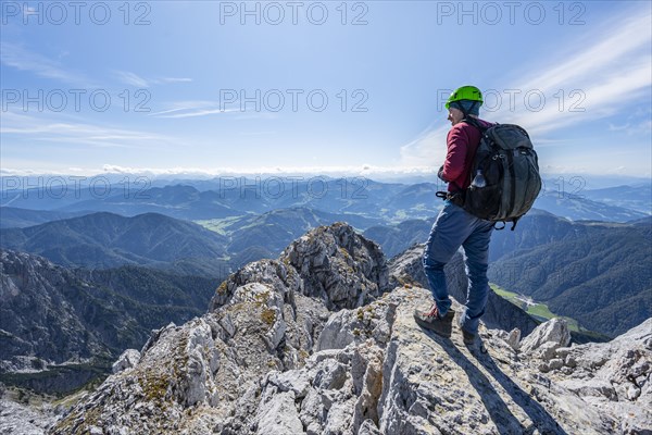 Hiker at the summit of Schaflegg