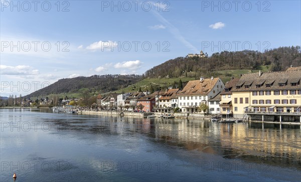 Picturesque view of the half-timbered houses and Hohenklingen Castle at the top of the hill