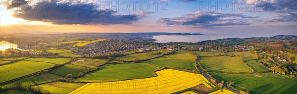 Sunset over Devon Fields and Farmlands from a drone