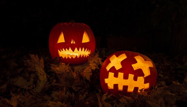 Glowing pumpkins at night