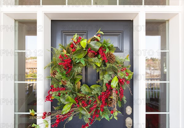 Christmas decorations at front door of house