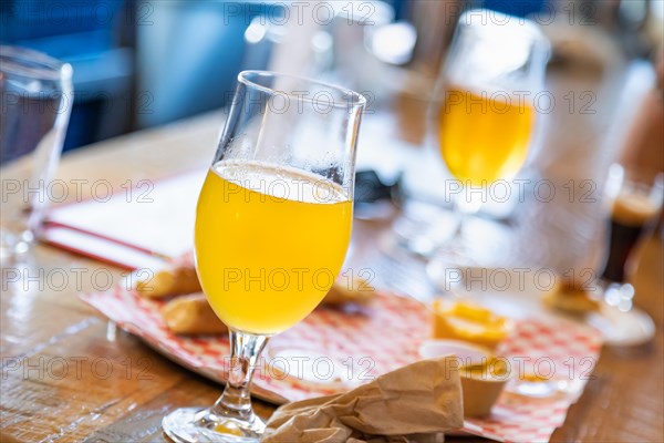 Abstract of small glass of micro brew beers on bar