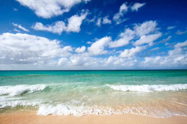 Beautiful beach and waves of Caribbean Sea