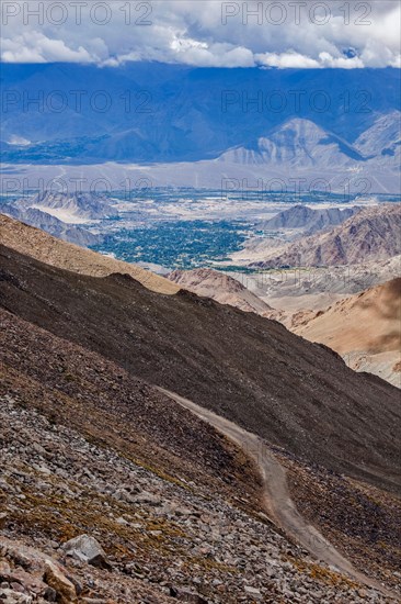 High altitude mountain road in Himalayas near Kardung La pass in Ladakh