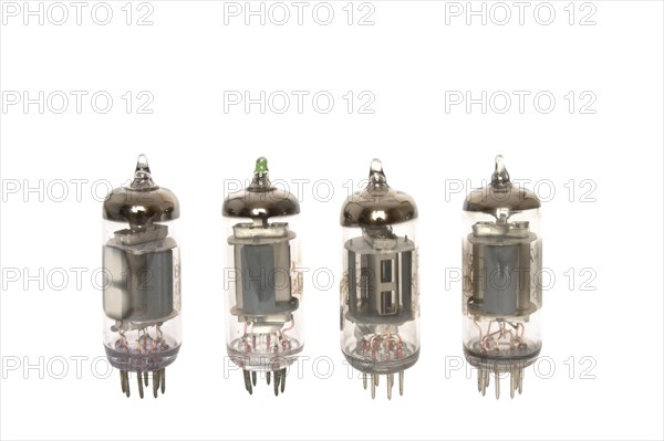 Old vacuum tubes on white background