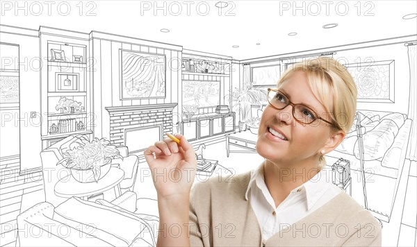 Woman with pencil over custom living room design drawing