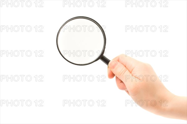 Woman hand holding magnifying glass isolated on white background